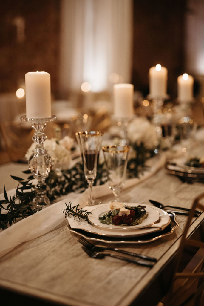 Black and gold wedding reception table