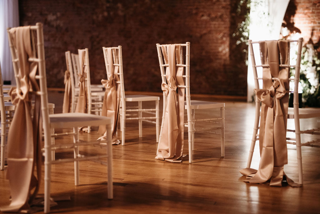 Ceremony chairs with satin sashes