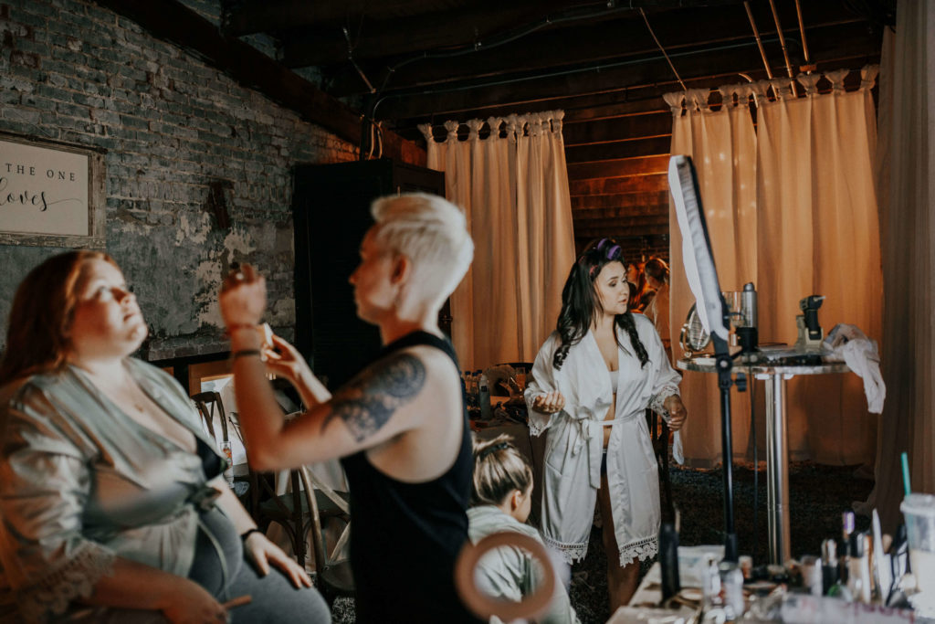 Bride and bridesmaids getting ready for industrial wedding in Tennessee