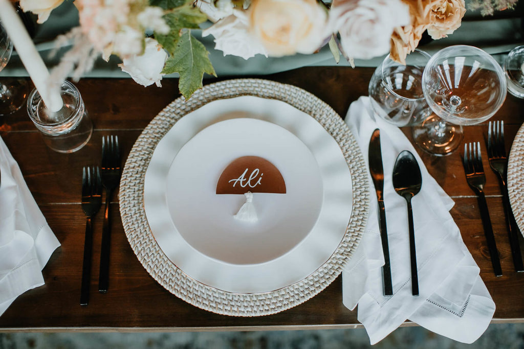 Boho edgy and neutral layered place setting for wedding
